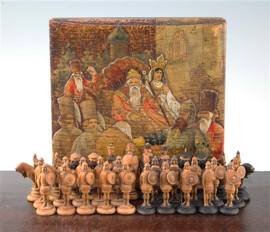 An unusual 19th century Russian figural carved wood chess set,